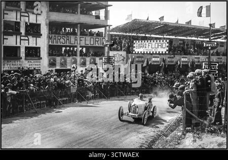 Jahrgang 1925 Targa Florio Gewinner Nr. 8 Constantini Bugatti 3-5-25, Targa Florio (Course automobile sur le Circuit des Madonies en Sicile) Costantini sur Bugatti. Das Rennen. Veranstaltung: XVI Targa Florio Datum: 3. Mai 1925 • Ort: Medio Circuito delle Madonie, Sizilien, Italien. Dies war ein anstrengender Straßenkurs mit über 1.400 Kurven pro Runde. • Distanz: Das Rennen wurde auf 5 Runden der 108 km (ca. 67,1 Meilen) Strecke mit einer Gesamtdistanz von 540 km (ca. 335,5 Meilen) geführt. • Wettbewerb: Die Targa Florio 1925 war in erster Linie ein heftiger Kampf zwischen den französischen Teams Bugatti und Peugeot, Stockfoto