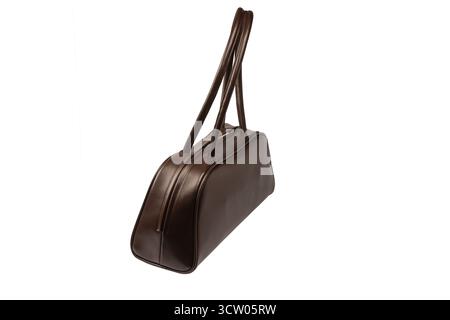 Bowling Browm Ledertasche isoliert auf weißem Hintergrund. Trendige Damentasche. Stockfoto
