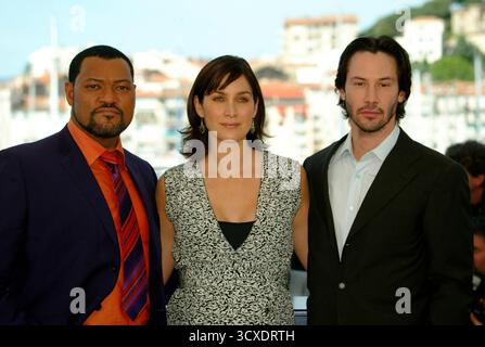 Laurence Fishburne, Carrie Anne Moss und Keanu Reeves werben für Matrix Reloaded auf den Filmfestspielen von Cannes 2003. Cannes, Frankreich, 14. Mai 2003 Stockfoto
