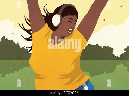 Sorglose junge Frau, die Musik mit Kopfhörern hört und im sonnigen Sommerpark tanzt Stockfoto