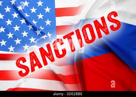 Wort SANKTIONEN gegen die Flagge Russlands und der USA Stockfoto