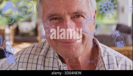 Sitzender älterer Mann in kariertem Hemd auf der Terrasse, überlagert Virus, Lupe, Seife, distanzierende Symbole Stockfoto