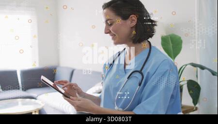 Mit Tablettenarzt mit Peelings in der Bürolounge, mit Stethoskop und Pflanze, Kopierraum Stockfoto
