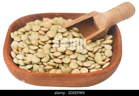 Grüne Linsen in einer Holzschale Stockfoto