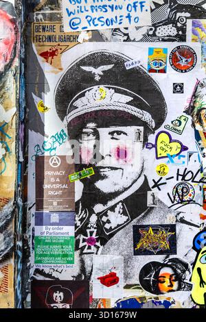 Politische Straßenkunst von Elon Musk in deutscher Uniform, Brick Lane, London, England Stockfoto