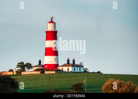 Happisburgh Lighthouse, historischer Leuchtturm an der Nordküste von Norfolk. Happisburgh, Norfolk, Großbritannien Stockfoto