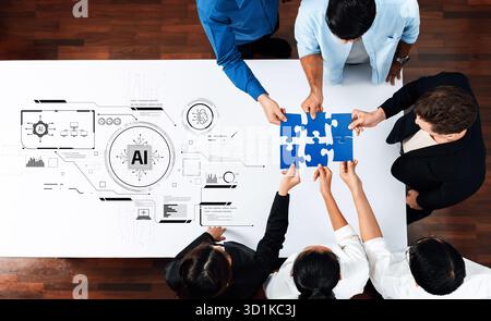 Ein vielseitiges Team von Fachleuten arbeitet an einem weißen Tisch zusammen und fügt Puzzleteile zusammen, während über künstliche Intelligenz und diskutiert wird Stockfoto