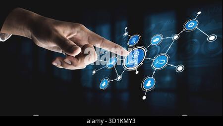 Ein Nahaufnahme-Bild mit einer Hand, die auf eine digitale Oberfläche zeigt und das Kundenbeziehungsmanagement mit miteinander verbundenen Elementen symbolisiert Stockfoto