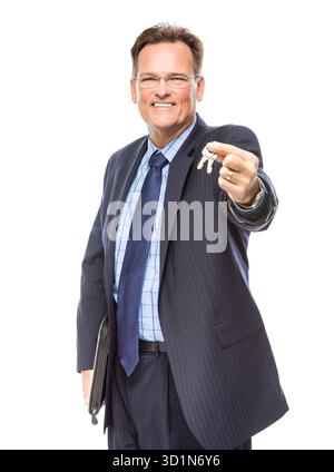Schöner Immobilienmakler, der Schlüssel zum neuen Zuhause hält Stockfoto