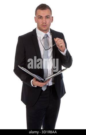 Jungunternehmer mit Dokumenten isoliert auf weiss Stockfoto