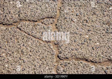 Asphalt in Nahaufnahme der Straßenoberfläche gerissen Stockfoto