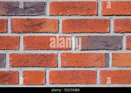 Nahaufnahme des Hintergrunds der roten Backsteinwand Stockfoto