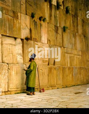 The Wailing Wall 1880 Gemälde des französischen Künstlers Jean-Léon Gérôme (1824–1904), das einen feierlich gekleideten jüdischen Mann im Gebet vor den antiken Steinen der Westmauer in Jerusalem zeigt. Stockfoto