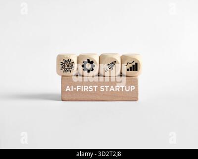 Holzwürfel mit Symbolen für künstliche Intelligenz, Einstellungen, Raketenstart und Wachstumskarte, die auf einer Basis mit dem Text Ai-First Star stehen Stockfoto