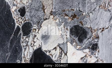 Nahaufnahme mit luxuriöser Marmorstruktur mit detaillierten Adern und kräftigen Farben Stockfoto
