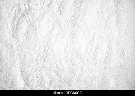 Weiße, zerknitterte Papierstruktur für den Hintergrund Stockfoto
