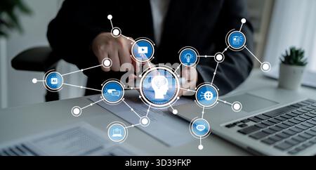 Ein moderner Profi bedient sich in einem hellen Büro mit einem Smartphone. Symbole für Technologie und Konnektivität veranschaulichen die digitale Kommunikation Stockfoto