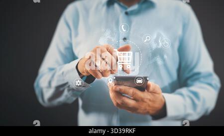 Online-Shopping. Mann mit Smartphone, fliegenden Ikonen, E-Commerce-Konzept Stockfoto