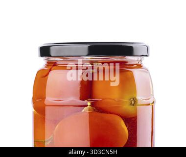 Essen, eingelegte Tomaten im Glasgefäß auf weißem Hintergrund Stockfoto