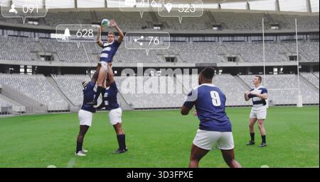 Mit Torpfosten, gestreiften Trikots und Stollen lässt sich der Rugby-Pullover auf dem Stadionfeld abheben Stockfoto