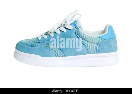 Blaue Sneakers auf weißem Isolathintergrund. Stockfoto