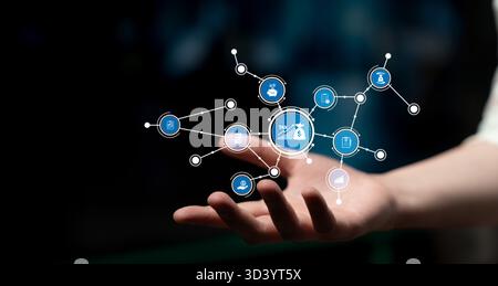 Eine visuelle Darstellung von Konzepten der Finanzierungstechnologie mit einer Hand und digitalen Symbolen. Die Abbildung zeigt Innovationen und Datenverbindungen in Stockfoto