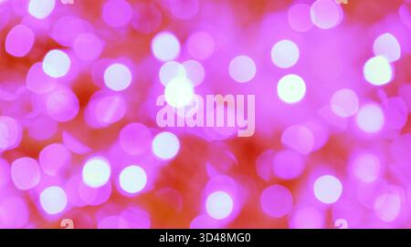 Verlaufslila und Rot abstrakte, verschwommene, glitzernde Lichter Stockfoto
