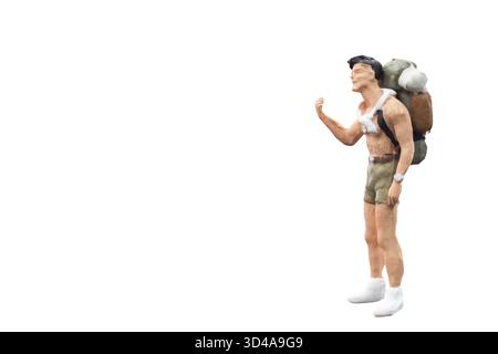 Miniatur-Backpacker, Touristen isoliert auf weißem Hintergrund mit Schneideweg Stockfoto