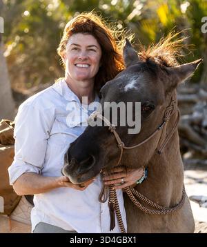 Reiten auf Marsh Tacky Horses auf Daufuskie Island. Stockfoto