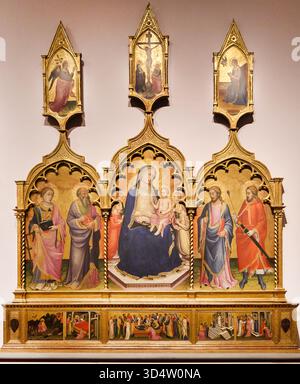 Thronende Madonna und Kind mit Engeln und Heiligen; linke Seite: St. Laurence und ein Evangelist; rechte Seite: Die Heiligen Jakobus der Grosse und Sebastian; Eckpunkte: Verkündigungsengel, Kreuzigung, Jungfrau Annunciate; Predella: Verkündigung an Joachim, Geburt der Jungfrau, Dormition der Jungfrau, Darstellung der Jungfrau im Tempel, Hochzeit der Jungfrau, Tempera 1391 1388 1424 Toskana, Italien. Stockfoto