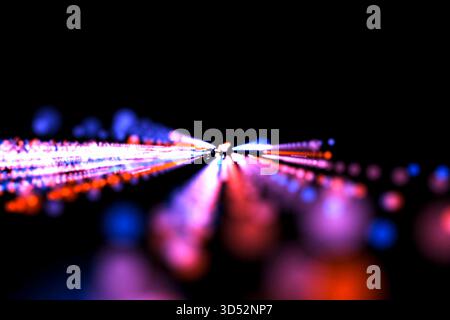 Strahlen und Lichter von rot und blau vom Zentrum zum Beobachter. Stockfoto
