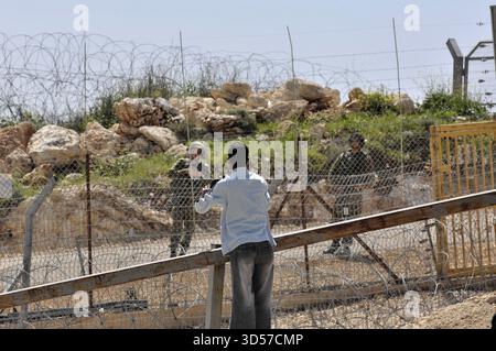 Westjordanland, Bil'in, 27.03.2009: Palästinensische Demonstration in dieser kleinen Stadt 12 km westlich von Ramallah, neben der israelischen Trennmauer und Stockfoto