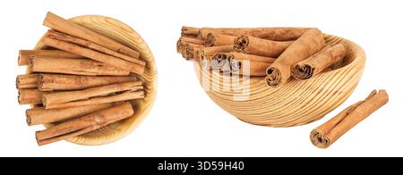 Zimtstangen in Holzschale isoliert auf weißem Hintergrund mit voller Schärfentiefe. Draufsicht. Flache Lagen. Stockfoto