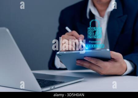 Sicherheitskonzept für Geschäftsdaten. Eine Person, die ein Kennwort auf einem Tablet eingibt. Schutz von Online-Informationen, vertraulichen Daten und intelligentem Zugriff. Daten bre Stockfoto