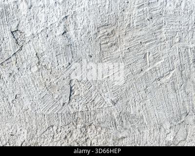 Grau beschädigte alte Zementwand. Verwitterter Betonboden. Hohe Auflösung. Stockfoto
