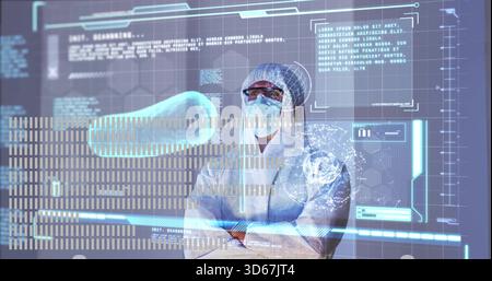 Überwachung von Forschern in Kapuzenanzug, Schutzbrille, Handschuhen im Reinraum, Betrachtung von HUD-Kapsel und Gehirn Stockfoto