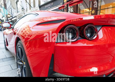 Sleek red Ferrari sports car, sculpted rear and taillights. London, UK, 28 August 2023 Stockfoto