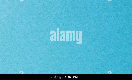 Blaue Papierstruktur mit subtilem Faserdetail-Nahthintergrund Stockfoto