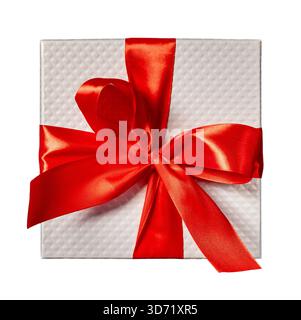 Weiße Geschenkbox mit rotem Band und großer Schleife. Stockfoto