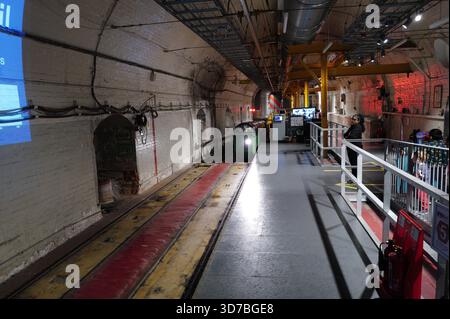Londons berühmte Mail Rail Fahrt im London Postal Museum. Dient als Röhre für den Posten unter den Straßen der Hauptstadt des Reiches. Stockfoto