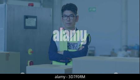 Inspektion des Lagermanagers mit Hivis Weste Blazer Kontrollkasten mit Not-aus-Schalter Stockfoto