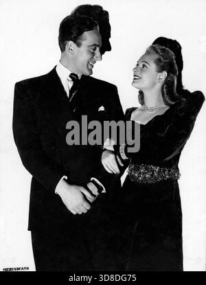 MICHAEL WILDING und ANNA NEAGLE Porträt im FRÜHJAHR IN PARK LANE 1948 Regisseur HERBERT WILCOX Drehbuch Nicholas Phipps aus dem Roman Come Out of the Kitchen von Alice Duer Miller Musik Robert Farnon Miss Neagle's Dresses Kitty Foster Productions Herbert Wilcox und Anna Neagle Herbert Wilcox Productions / British Lion Film Corporation Stockfoto