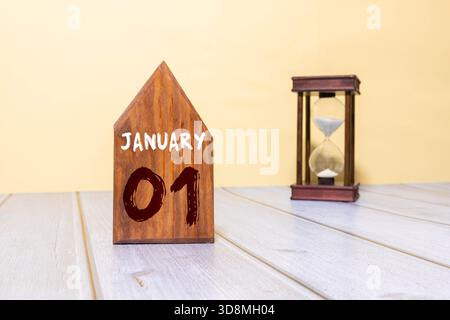 Hölzerner ewiger Kalender mit dem 1. Januar Stockfoto