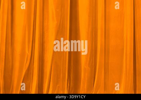 Helle Orange Seidenbühne Vorhänge Textur Hintergrund Stockfoto