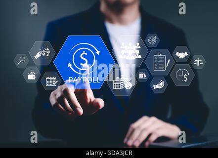 Lohn- und Gehaltsabrechnungs- und Finanzverarbeitungssystem. Geschäftsmann arbeitet mit Symbolen für Zahlungen, Mitarbeitergehälter, Terminplanung, Stockfoto