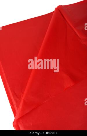 Weihnachtliche rote Papiertücher für Blumenverpackungen angeordnet in Stapel isoliert auf weißem Hintergrund verwendet für Blumenstrauß-Styling festliche Dekoration und Verpackung Stockfoto