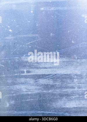 Abstrakte blaue Hintergrundstruktur mit Kratzern und Staub Stockfoto
