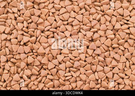 Trockenfutter für Katzen und Hunde - Trockenfutter. Organischer Texturhintergrund Stockfoto