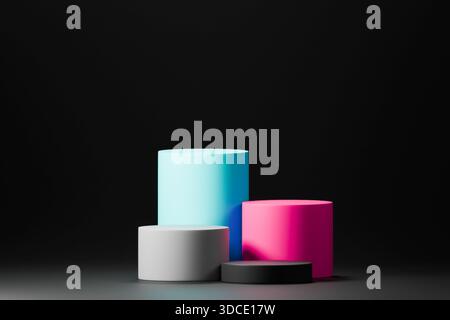 Mehrfarbige Zylinderpodien auf dunklem Hintergrund Stockfoto