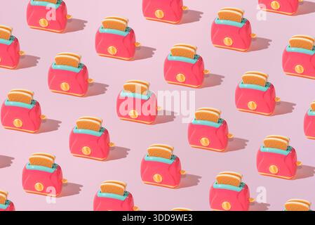 Kreatives Muster mit Toastbrotscheiben und Toaster flach auf pastellrosa Hintergrund minimalistisches Konzept Stockfoto